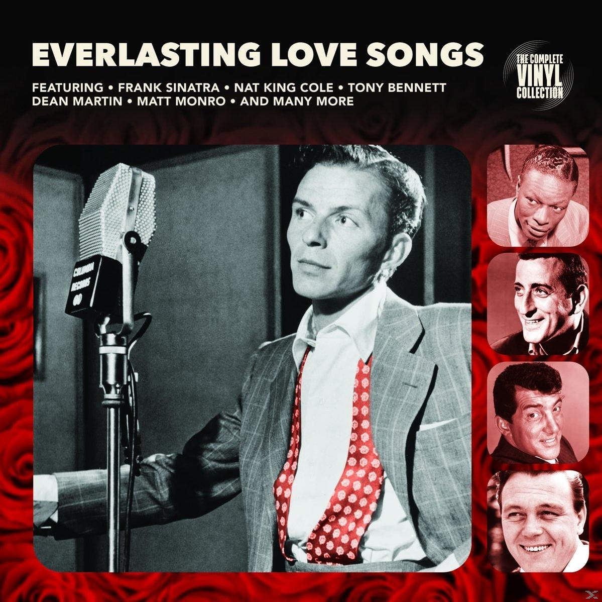 Egy fekete-fehér fotó egy öltönyös férfiról mikrofonnal. A szöveg a képen: 'Everlasting Love Songs'.