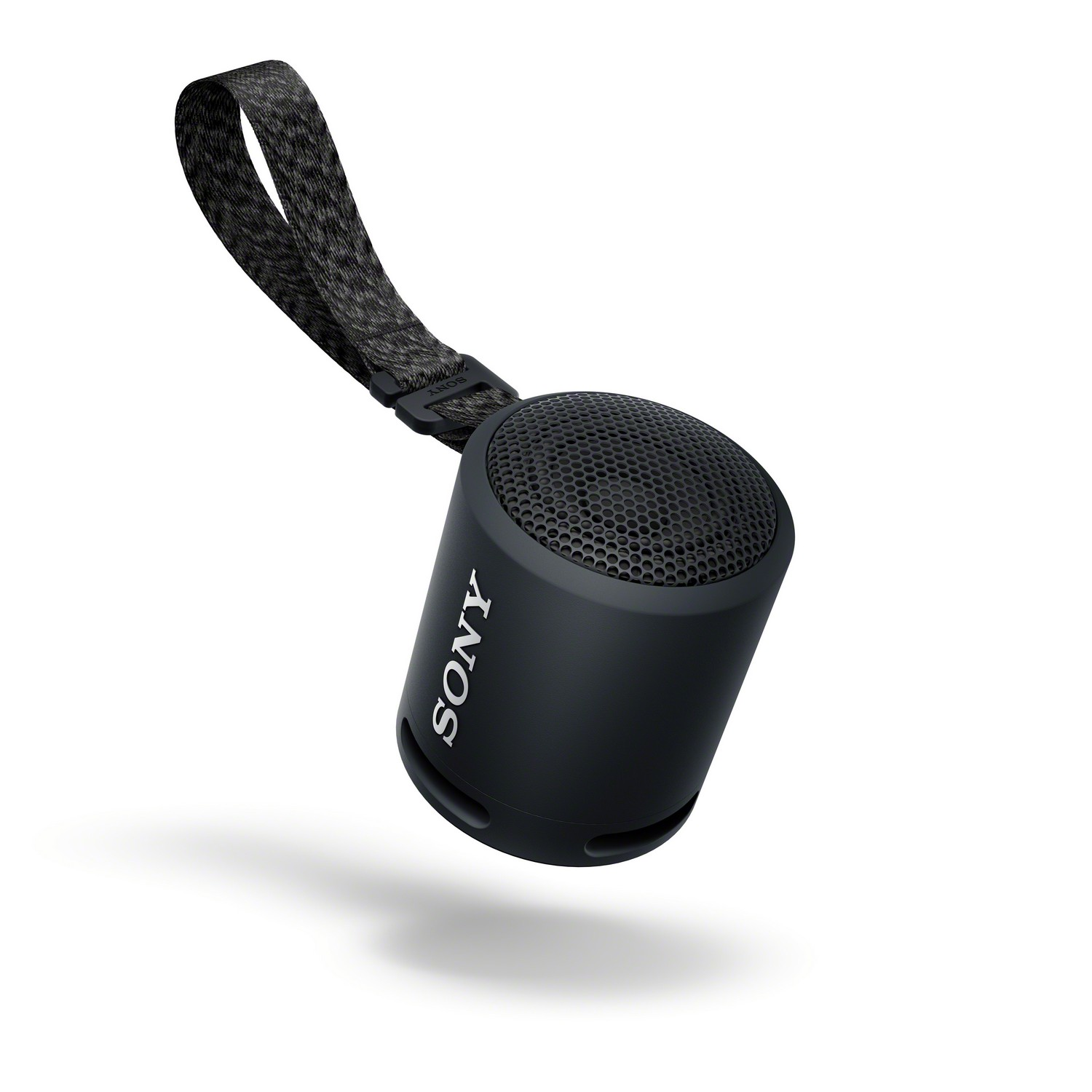 Un mini-altavoz blanco y negro con correa, con la palabra SONY visible.