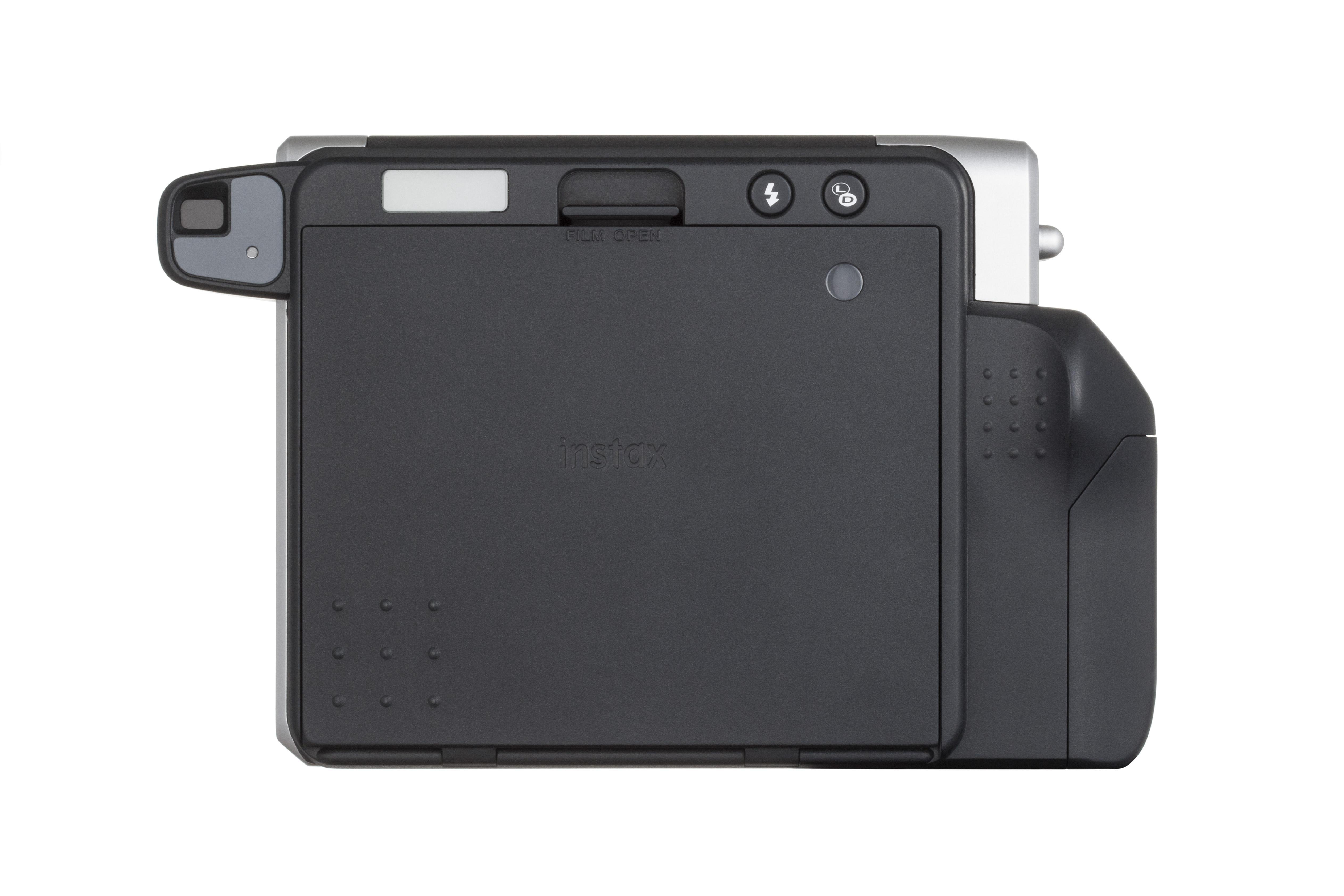 Eine schwarze und silberne Instax-Kamera von oben gesehen. Sie hat eine Filmtür und einen Blitz.