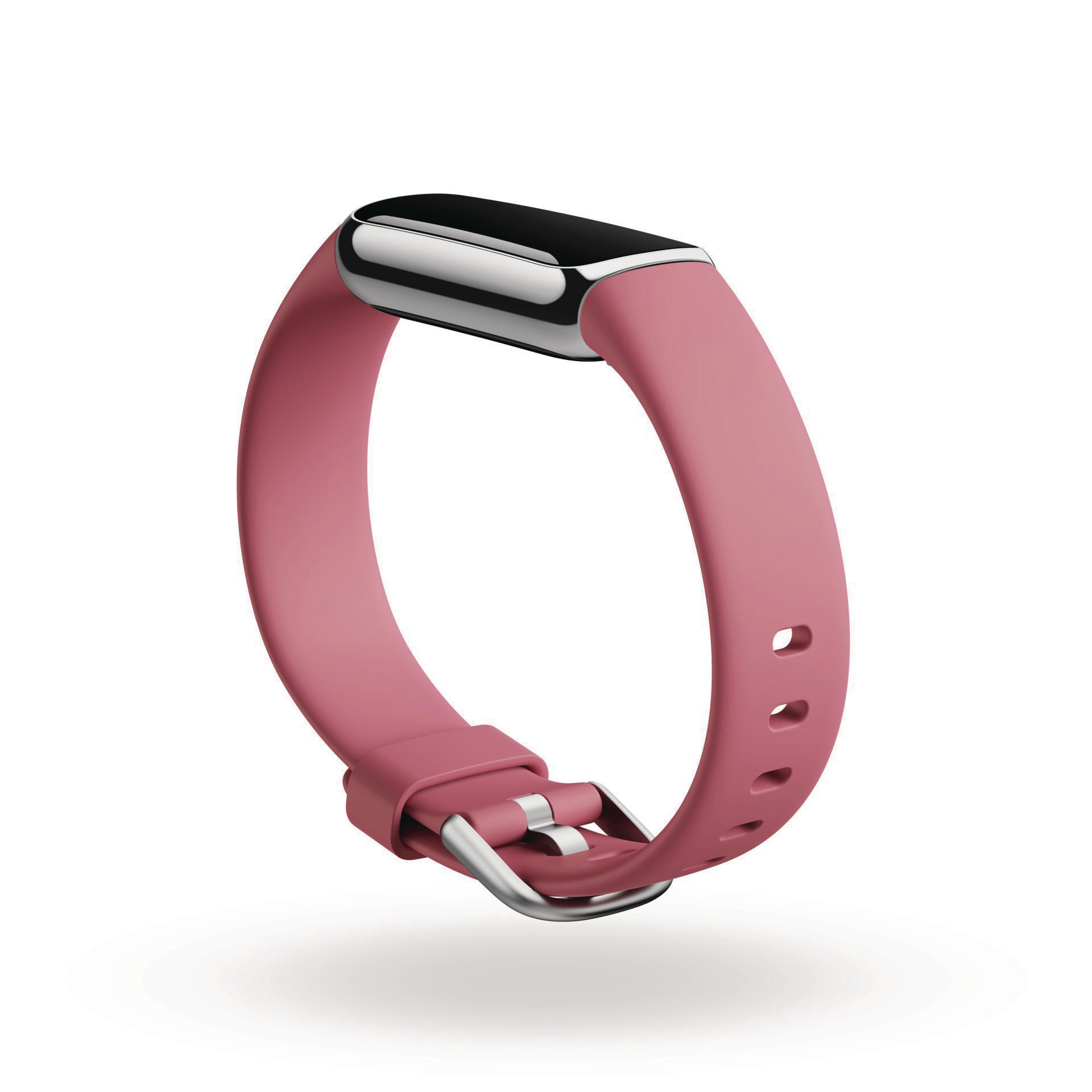 Ein rosafarbenes Smartband mit silbernem Akzent und Schnalle.