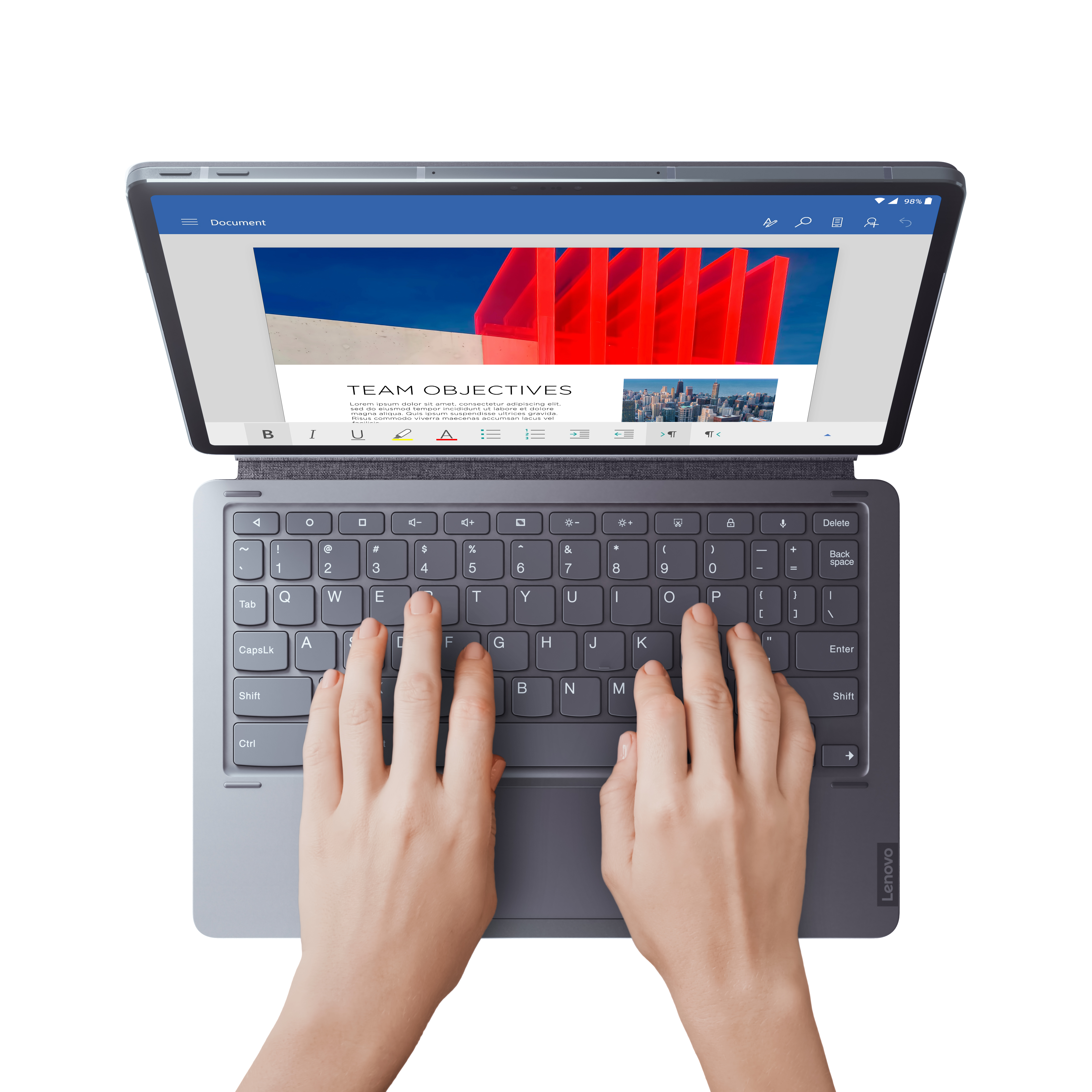 Ein Tablet mit Tastatur, das ein Dokument auf dem Bildschirm zeigt. Hände tippen auf den Tasten.