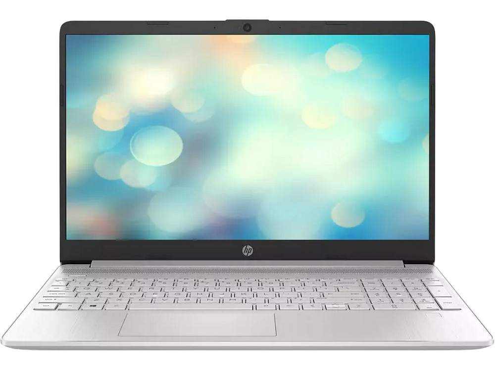 Portátil plateado con teclado retroiluminado. La pantalla muestra luces bokeh borrosas.