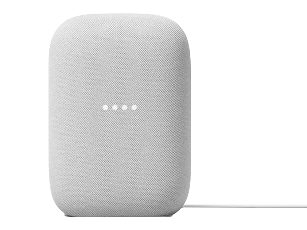 Altavoz Google Nest blanco, forma ovalada, tres puntos.