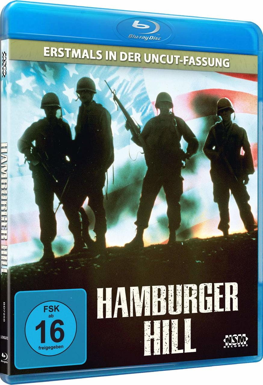 Eine Blu-ray-Hülle für 'Hamburger Hill'. Silhouetten von Soldaten vor einer Flagge.