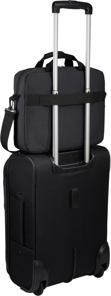 Sacoche noire pour ordinateur portable fixée sur une valise noire à roulettes.