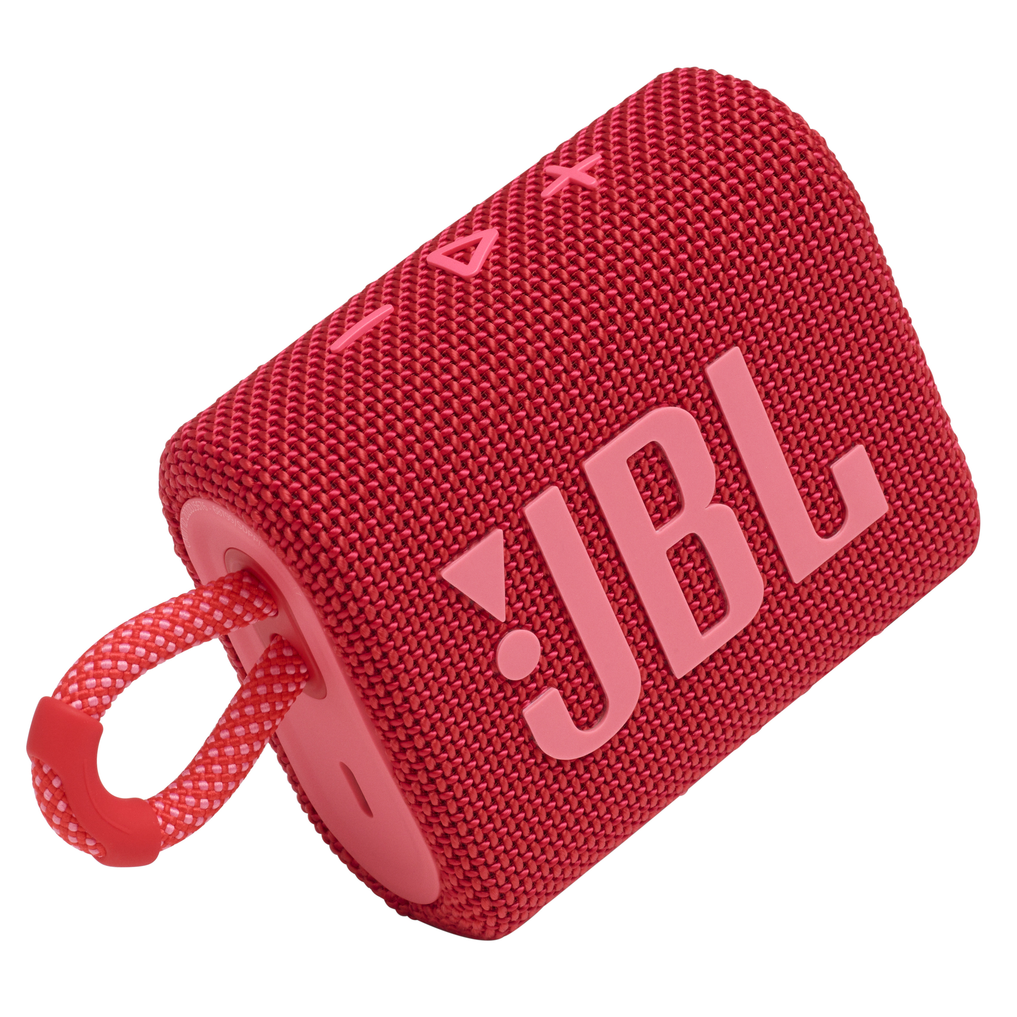 Pembe bir vurgu ve kırmızı bir taşıma kayışı ile kırmızı JBL hoparlör. Beyaz bir zemin üzerinde.