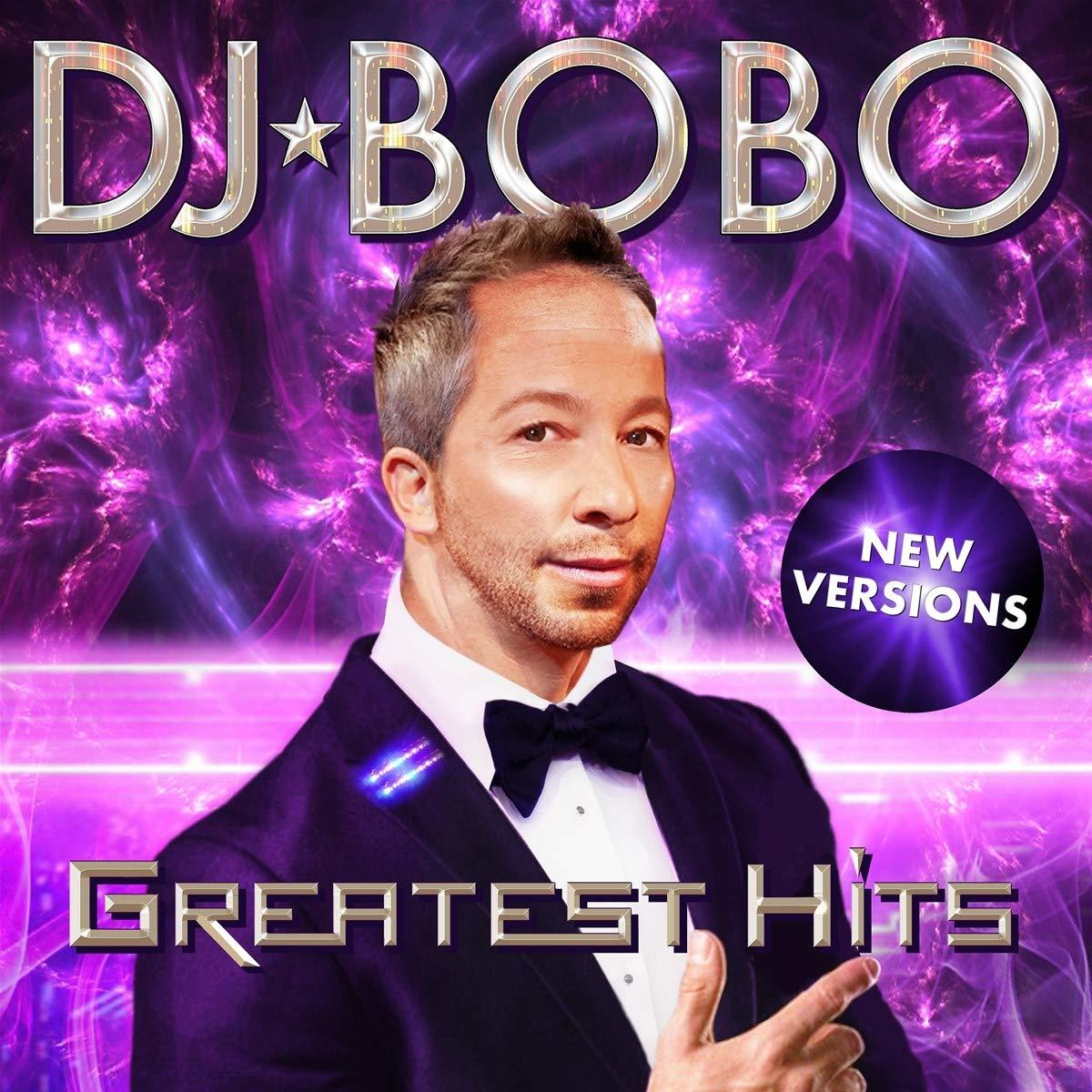 Albumcover mit DJ Bobo. Ein Mann im Anzug mit Fliege. Lila und pinkfarbener Hintergrund.
