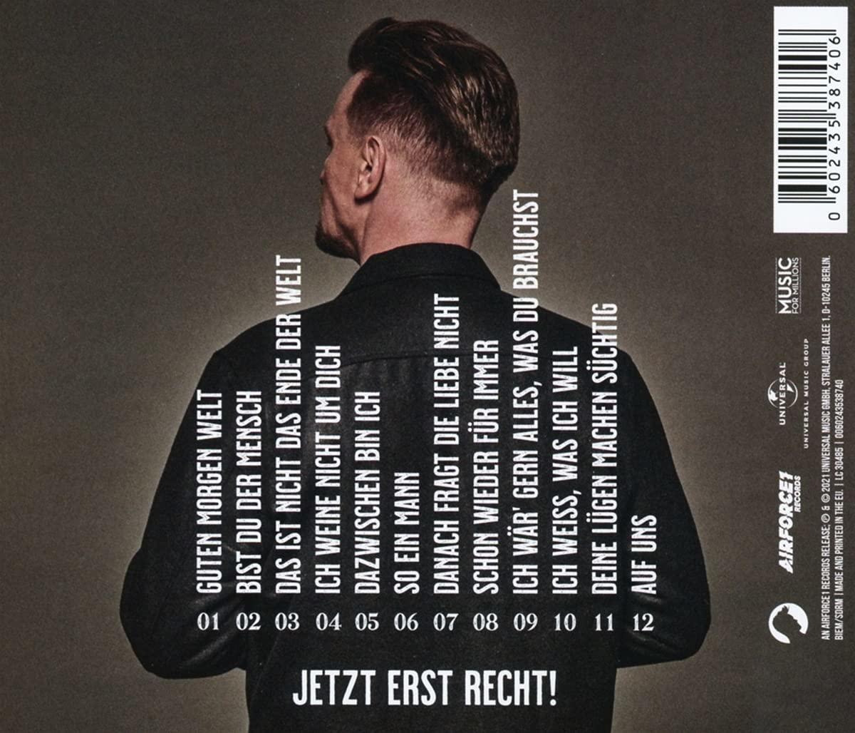 Rückseite eines Mannes mit deutschem Text auf einem Musikalbum.