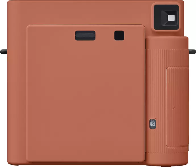 Orange Kamera, Rückansicht, mit quadratischem Sucher und einer kleinen 'S'-Taste.