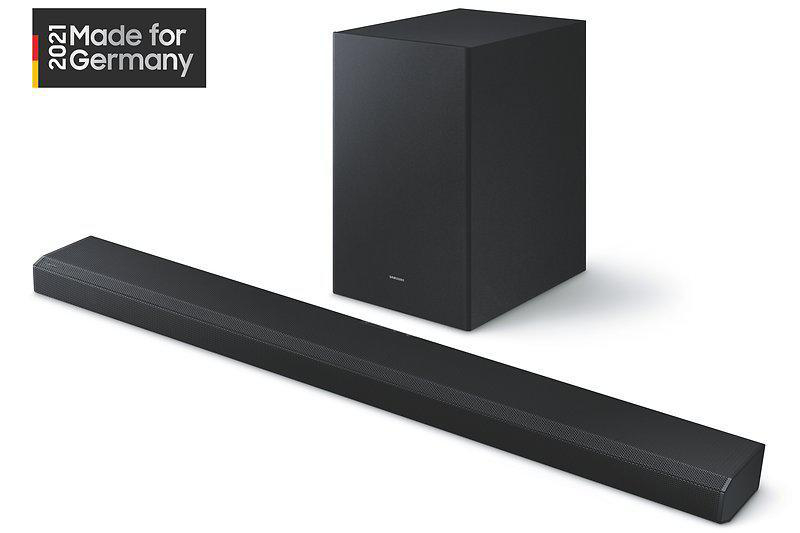 Schwarze Soundbar und Subwoofer, mit 'Made for Germany' Logo auf Weiß.
