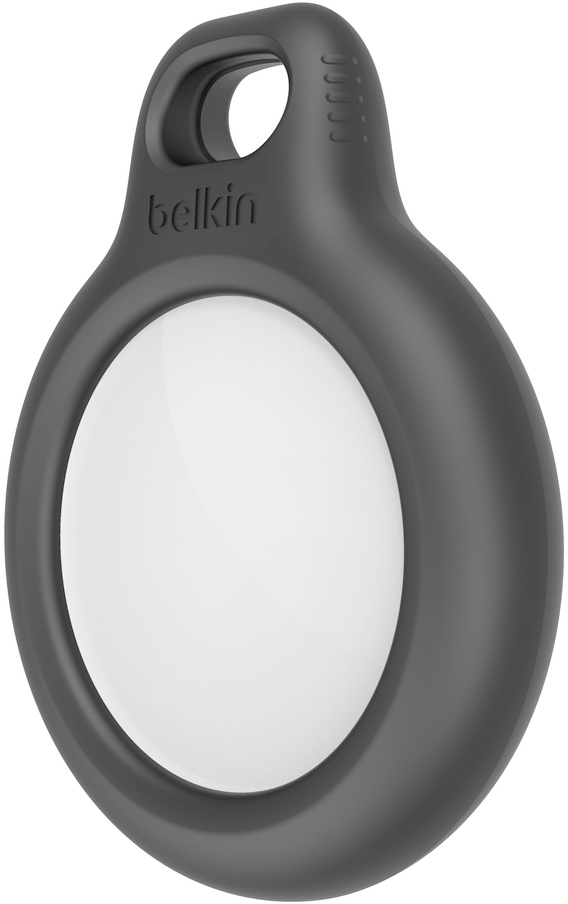 Black Belkin AirTag, white center. Oval shape, with a hole at the top for attachment.