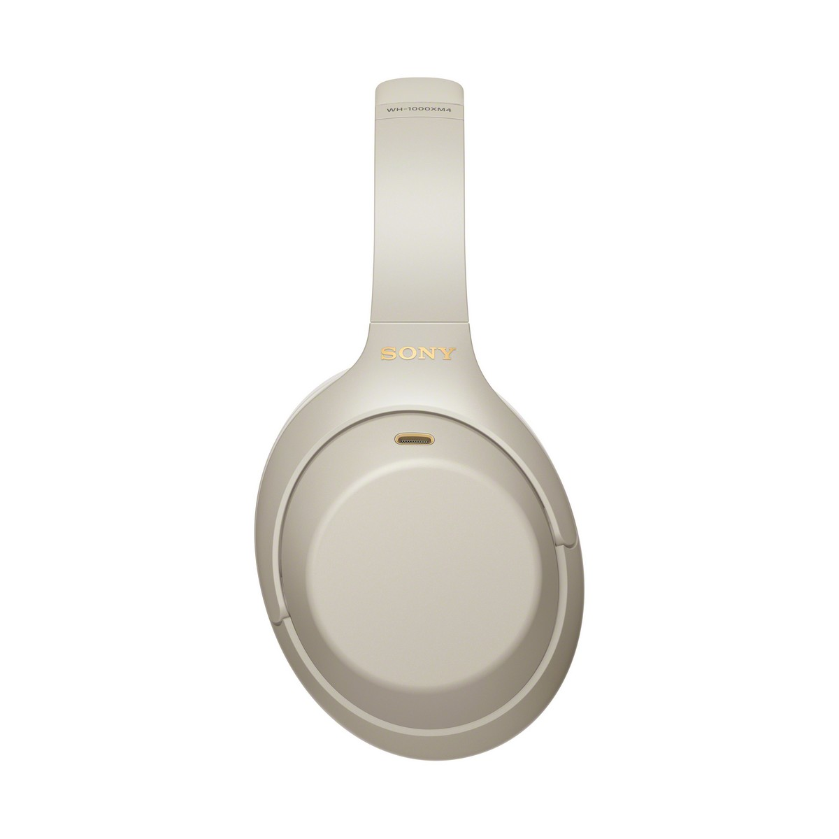 Auriculares supraaurales beige sobre fondo blanco. Se ve la marca Sony. Diseño moderno.