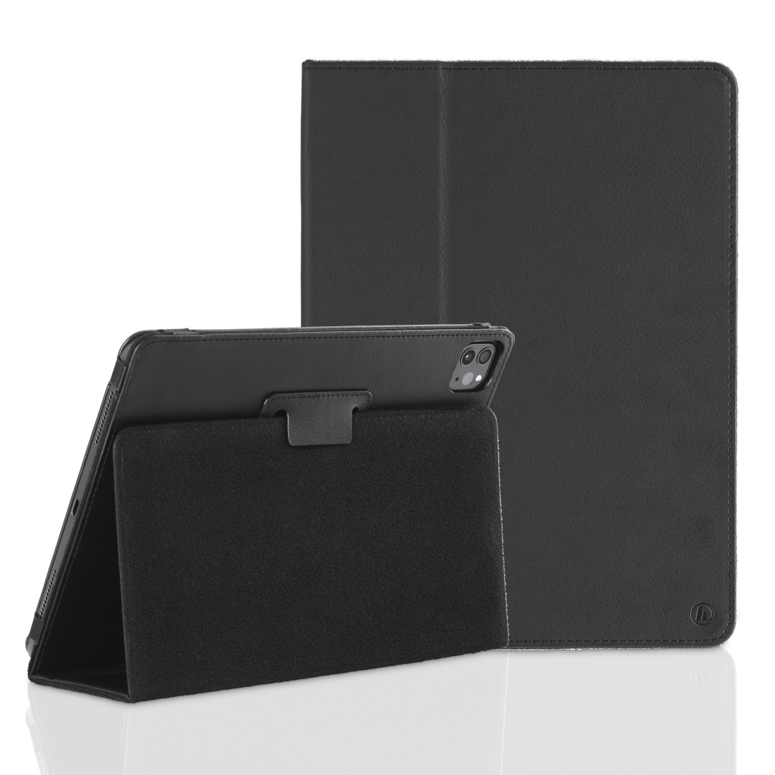 Ein schwarzes Tablet, das auf seiner Seite steht.