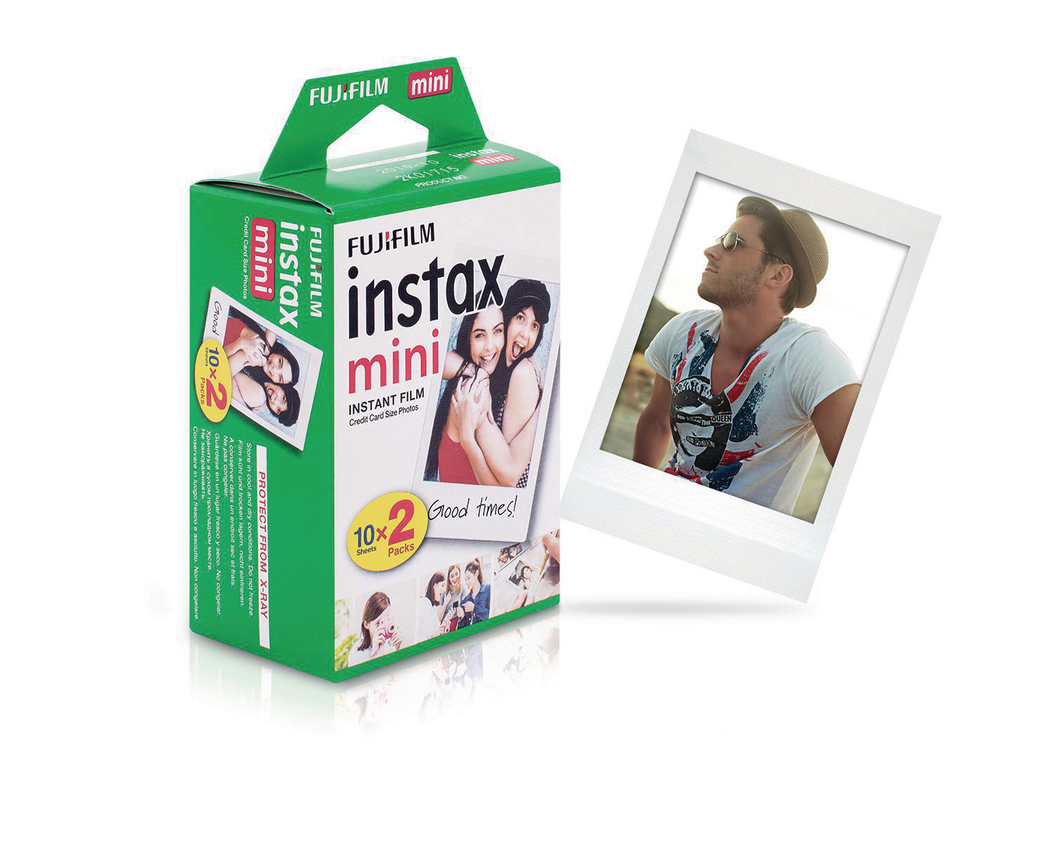 Instax Mini Filmbox neben einem Foto.