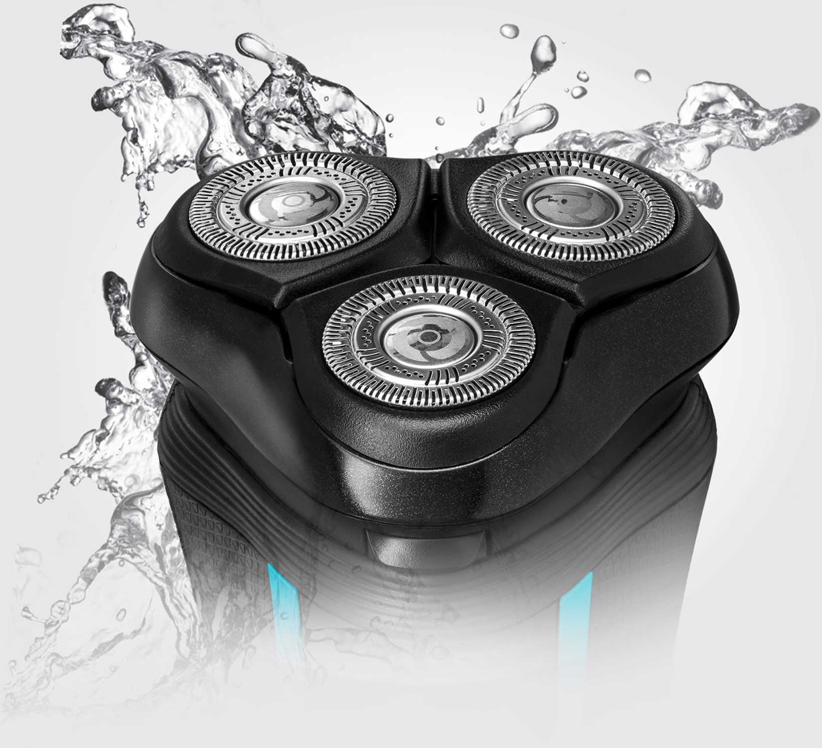 Black razor head with three circular blades and water splashes around it.