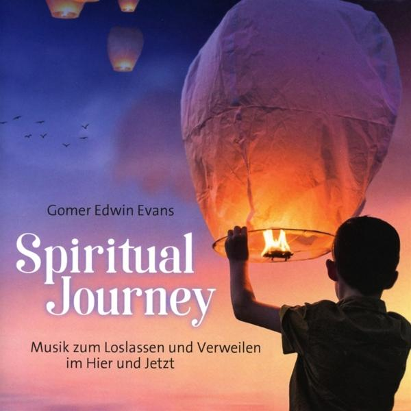 Buchcover mit einem Jungen, der eine Laterne freilässt. Titel: Spirituelle Reise.