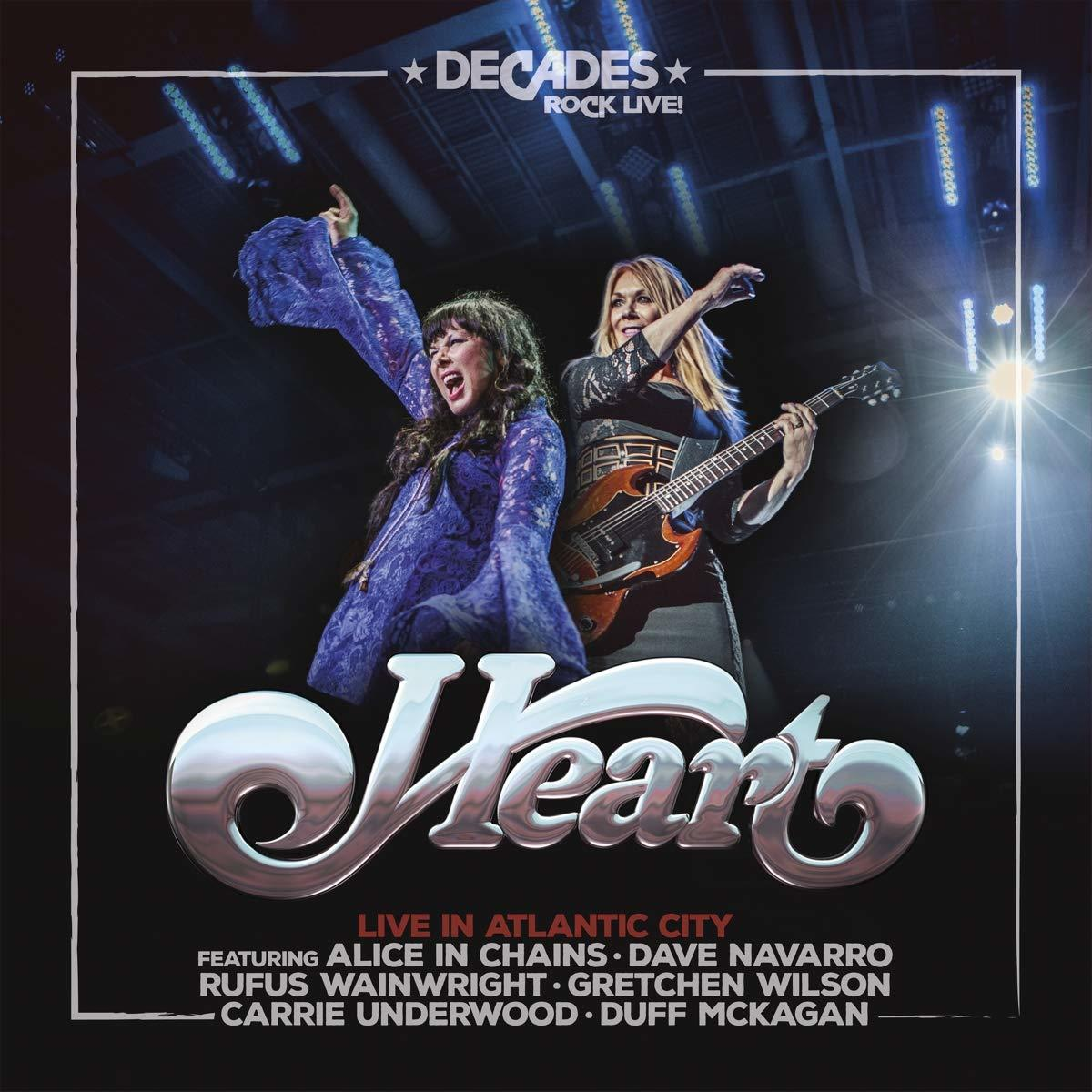 Albumcover: Heart live in concert. Zwei Frauen singen und spielen Gitarre. Text: Heart, Live in Atlantic City.