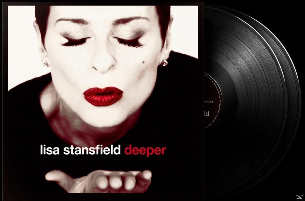 Eine Frau, die einen Kuss mit roten Lippen bläst, mit einem Vinyl-Albumcover.