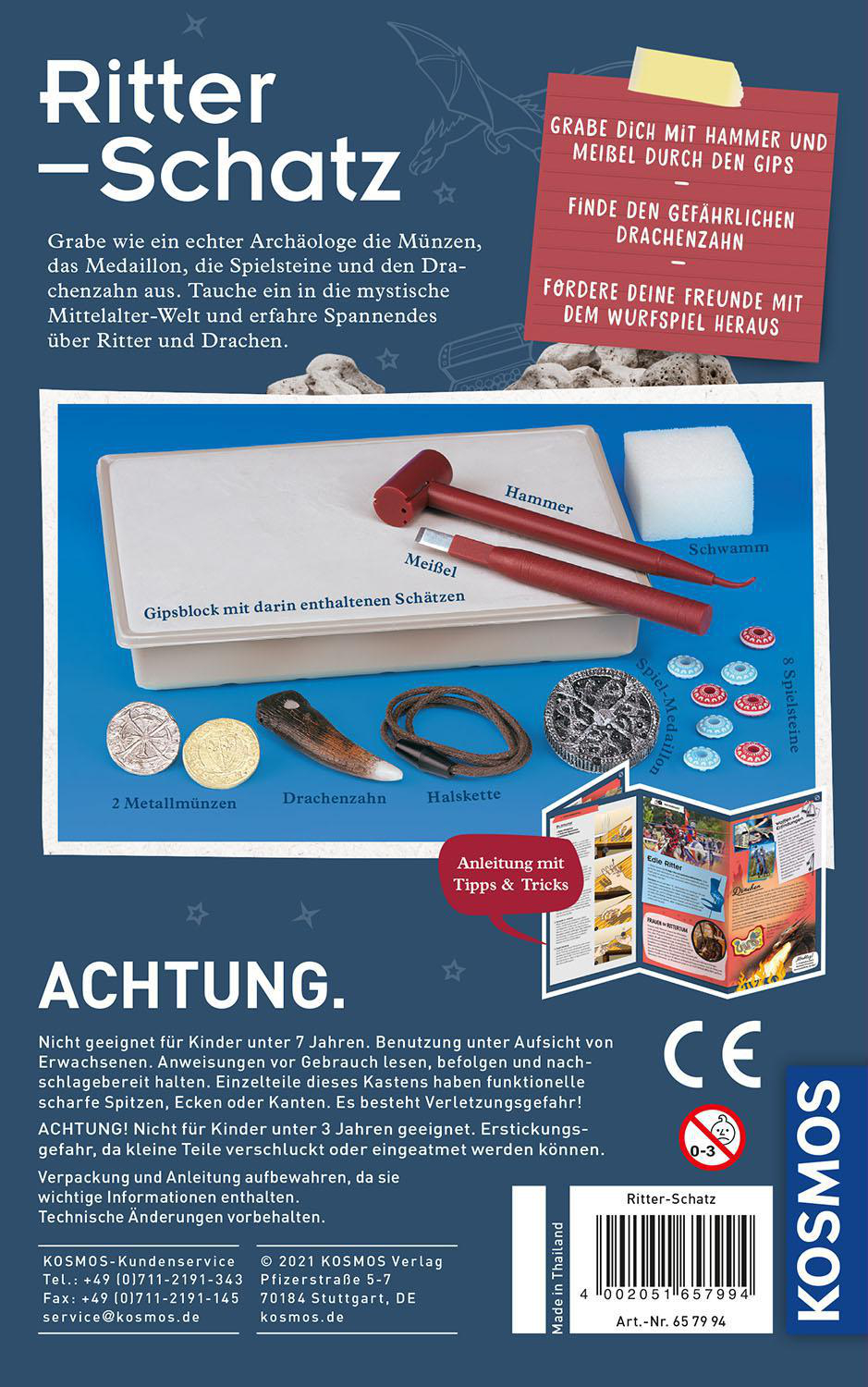 Box mit Spielkomponenten, darunter Münzen, Hammer und Meißel.