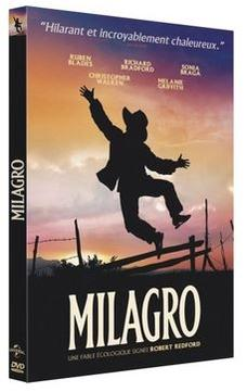 DVD-box van 'Milagro'. Een silhouet springt vrolijk in een zonsondergang.