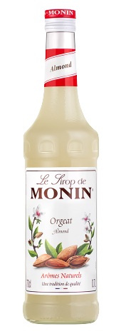 Monin Orgeat Mandel-Sirup Flasche. Es ist eine hohe, klare Flasche mit rotem Deckel und weißem Etikett.