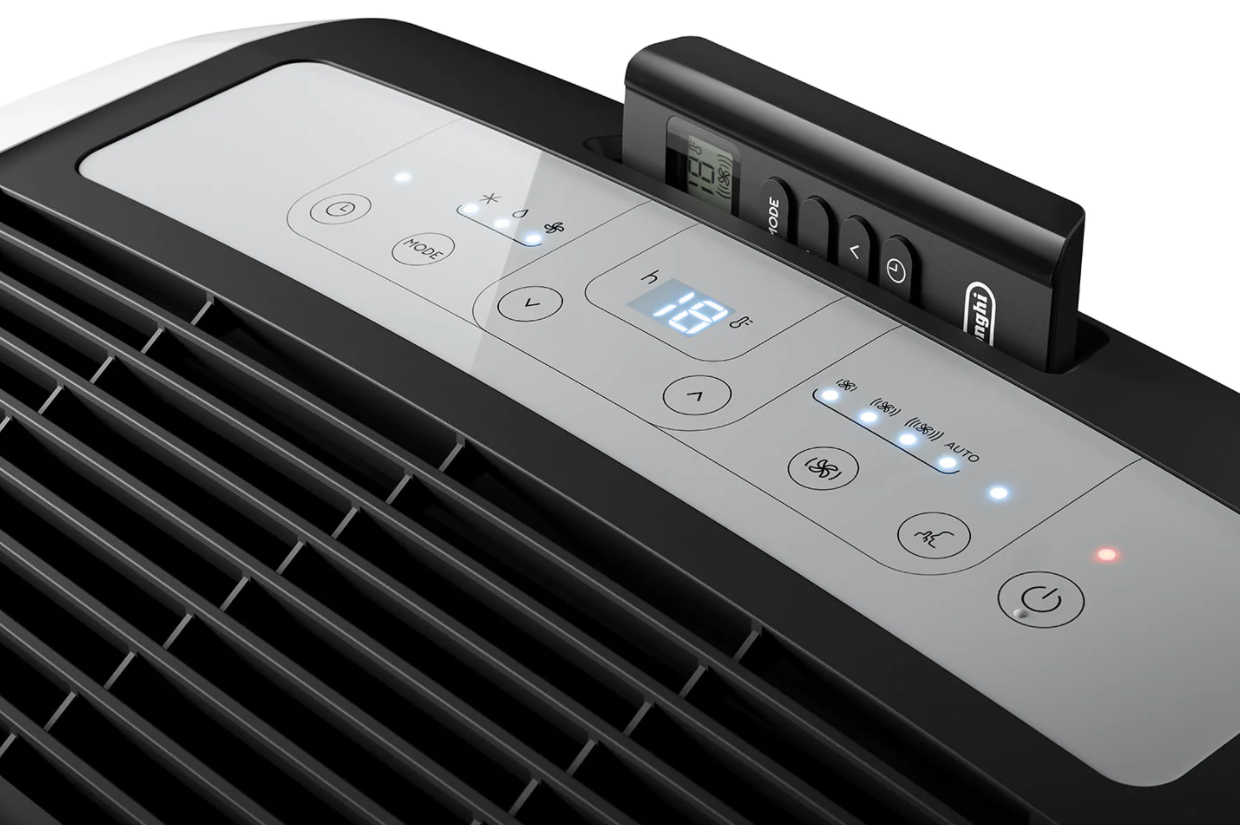 Close-up of a dehumidifier control panel with buttons and a digital display.