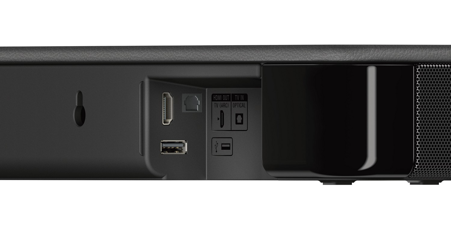 Parte trasera de una barra de sonido negra con varios puertos. Incluye HDMI, USB y conexiones ópticas.