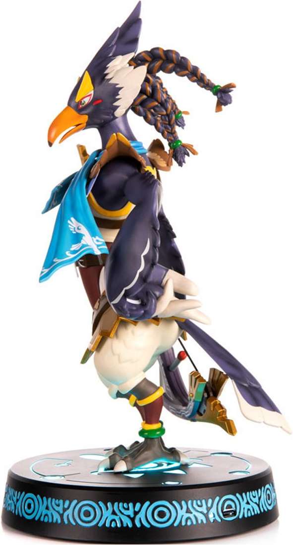 Eine detaillierte Figur einer vogelartigen Figur mit kompliziertem Design, die auf einer Basis steht.