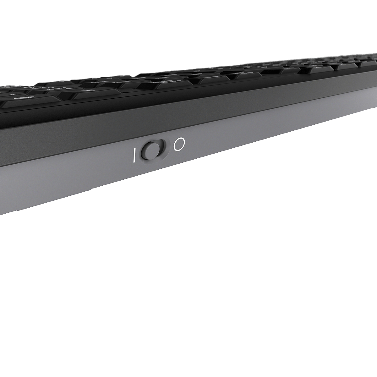 Nahaufnahme der Seite einer schwarzen Tastatur mit Netzschalter, weißer Hintergrund.