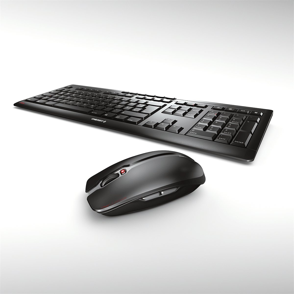 Schwarze Tastatur und Maus auf weißem Hintergrund. Die Tastatur hat Tasten und die Maus hat Tasten.