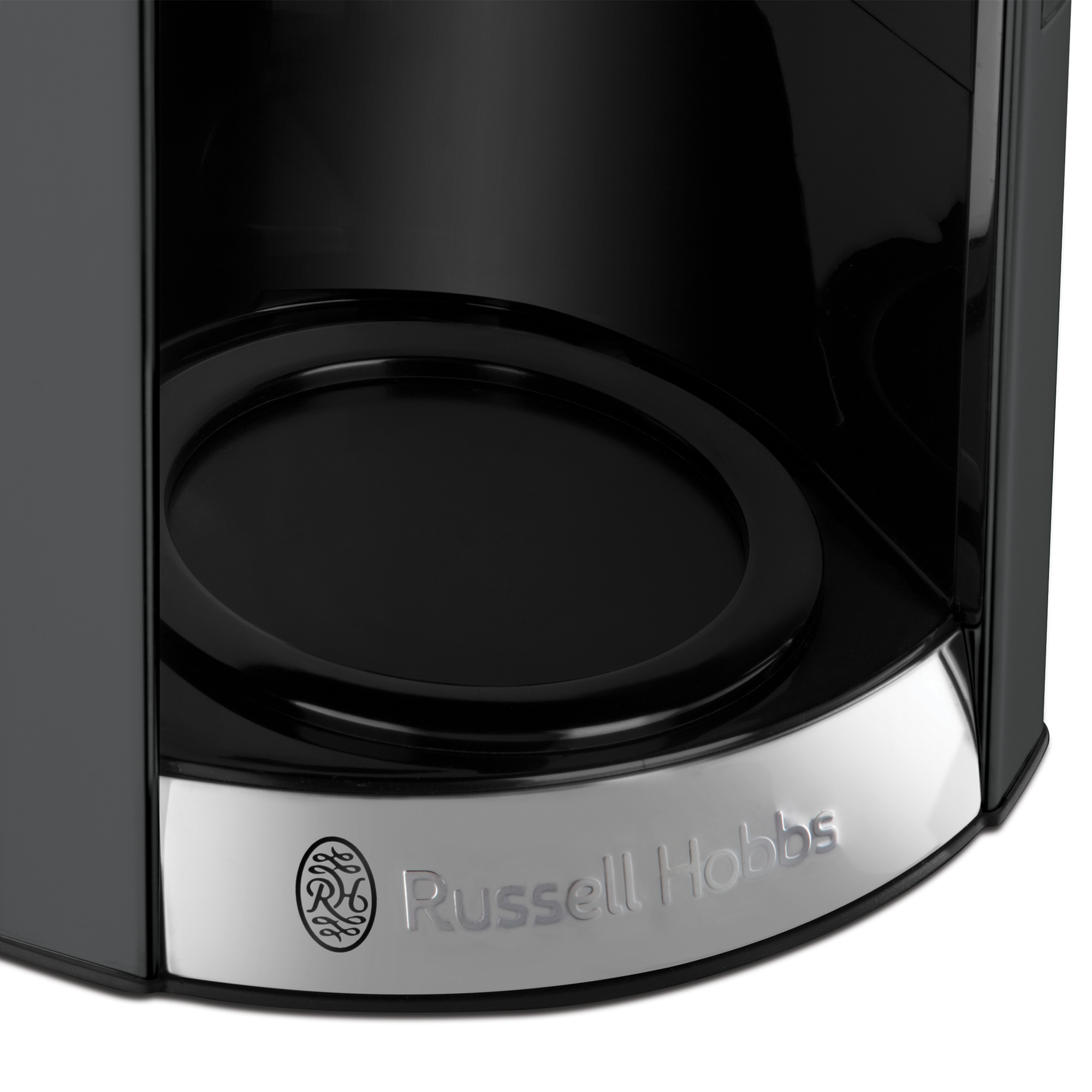 Black Russell Hobbs coffee maker, close-up of the base with the logo, on a white surface.