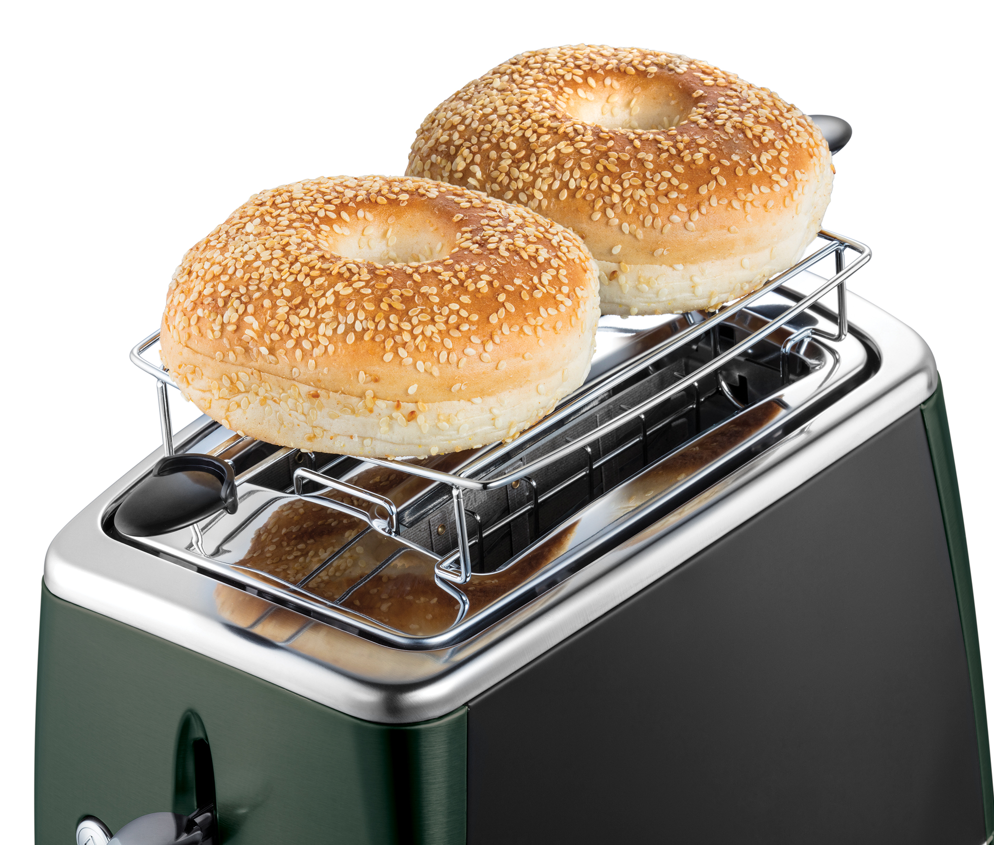 Toaster with two sesame bagels. Bagels sit on a metal rack on the toaster.