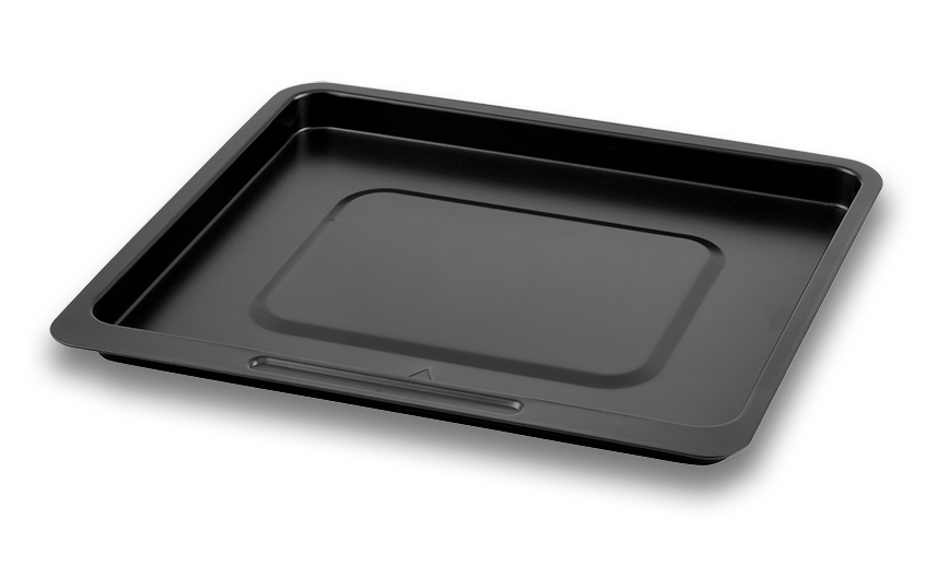 A black oven tray on a dark background.