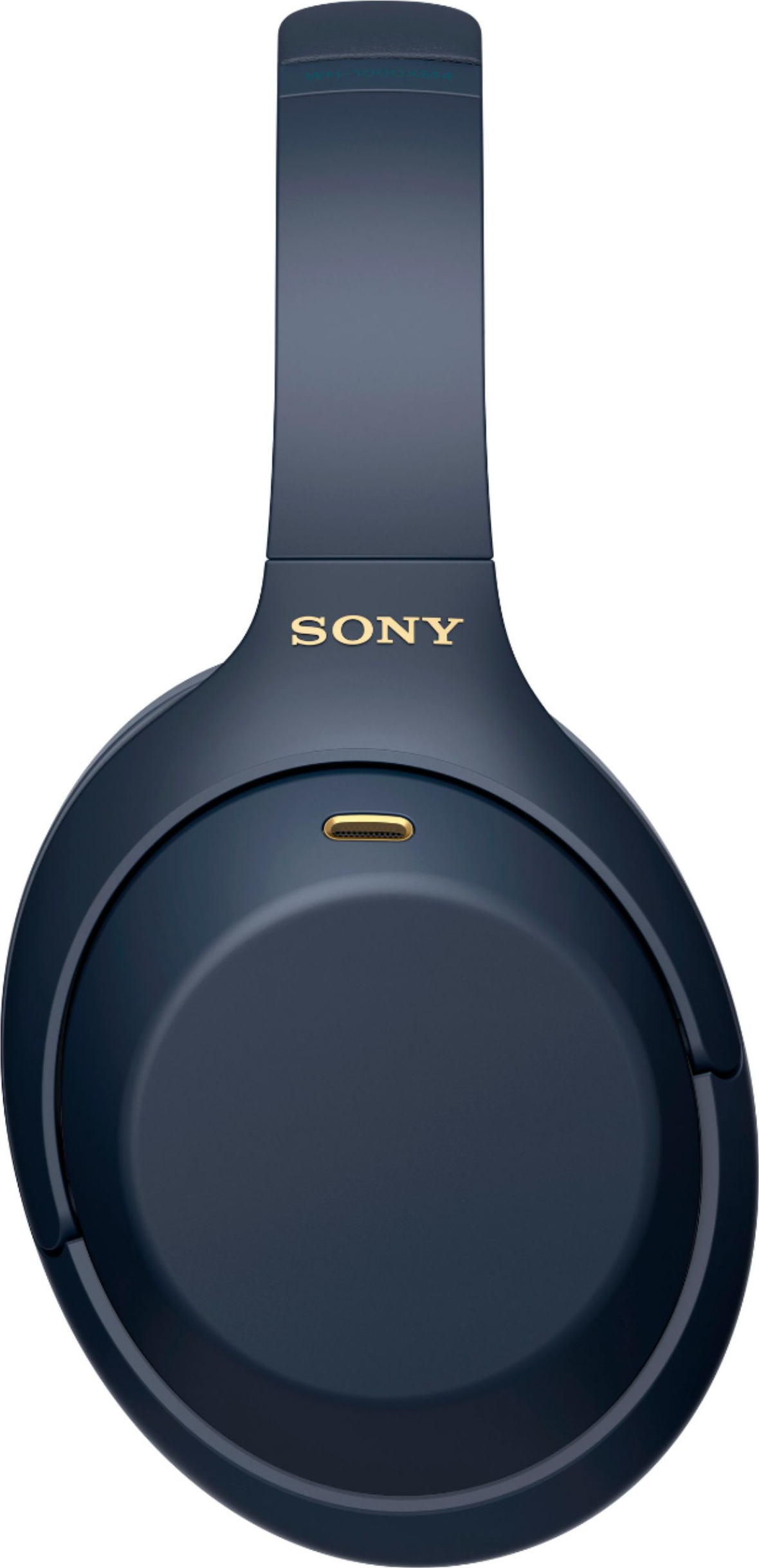 Casque Sony bleu foncé avec lettrage doré et un port de chargement.