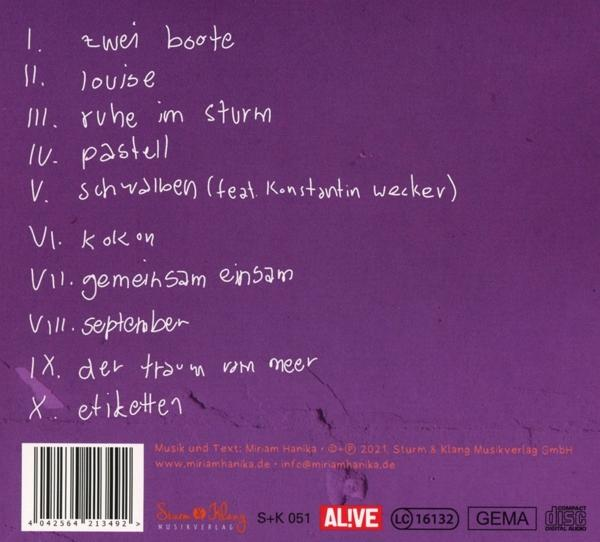 Lila Albumcover mit handschriftlichem Text und Barcode. Weißer Hintergrund.