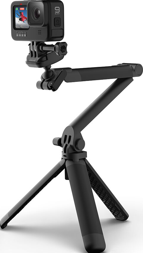 Caméra GoPro noire sur un trépied avec une poignée rétractable, sur fond blanc.
