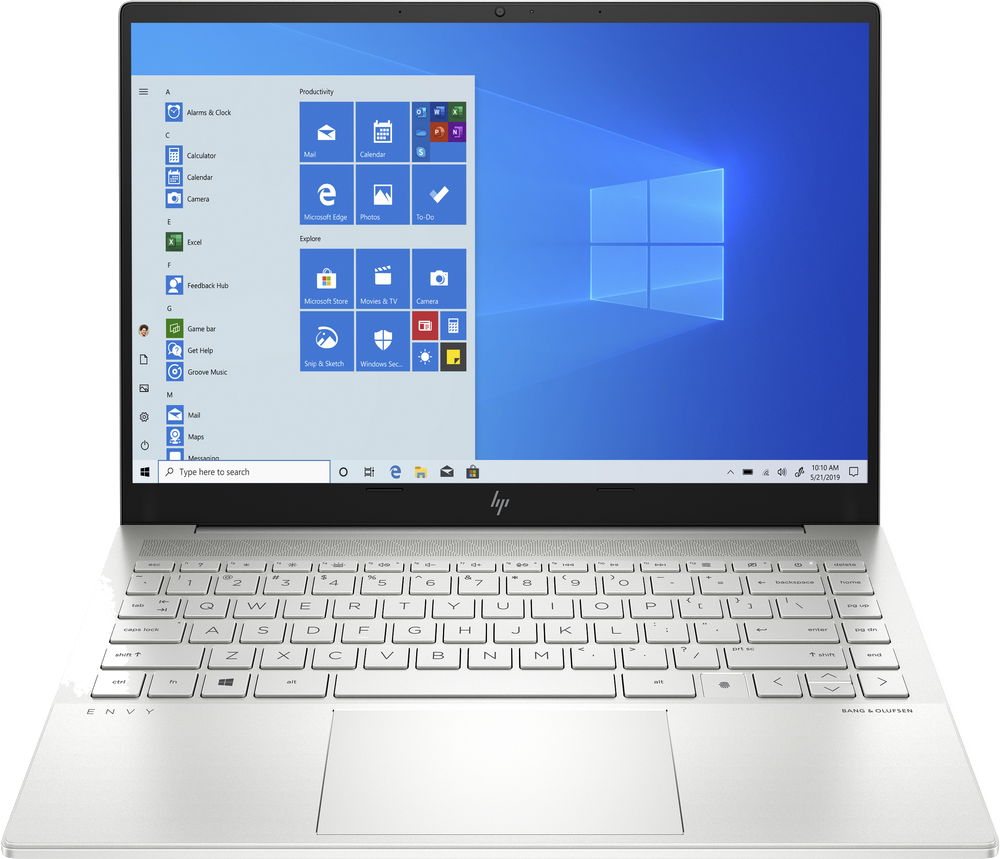 Portátil plateado abierto, mostrando la interfaz de Windows. Teclado abajo, pantalla con iconos.