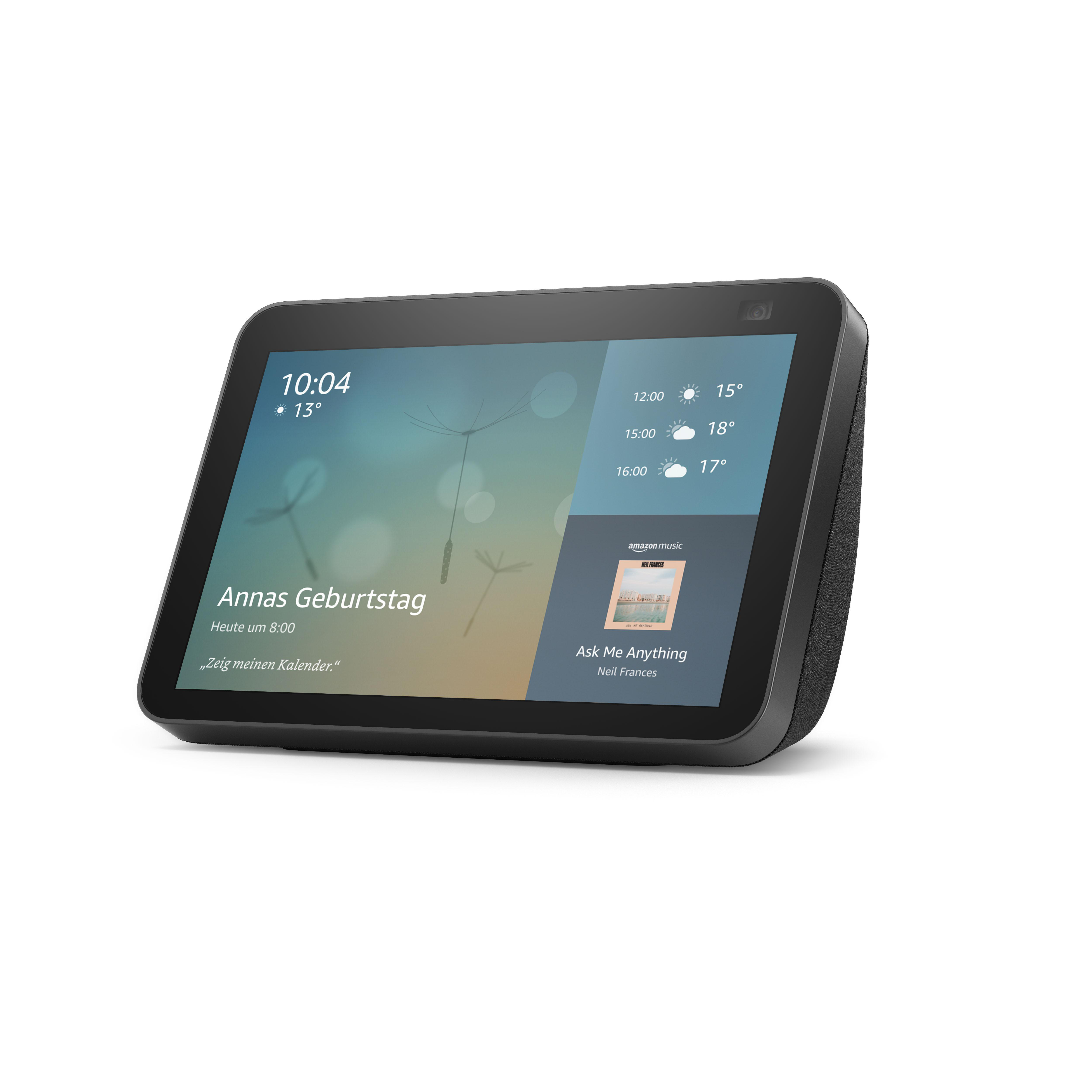 Schwarzes Smart Display zeigt Zeit, Wetter, Kalender und einen Amazon Music-Bildschirm.