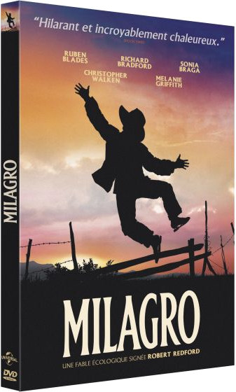 DVD-hoes van 'Milagro'. Een man springt met opgeheven armen. Zonsondergang achtergrond.