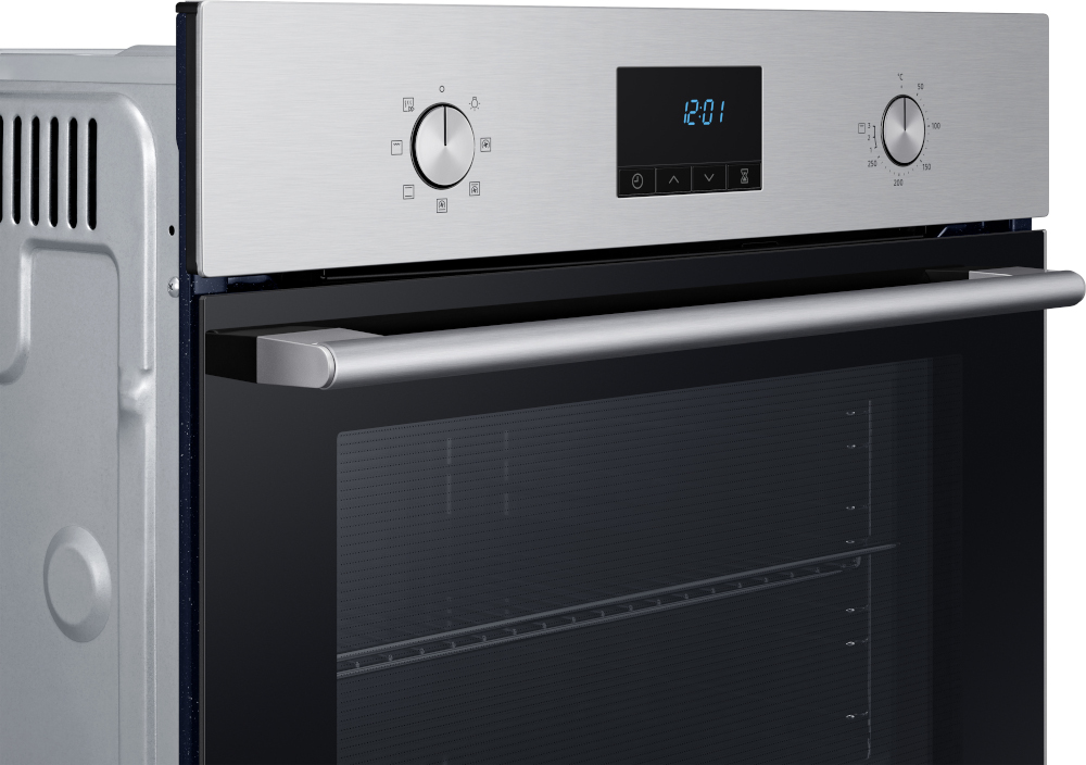 A stainless steel oven with a black glass door and a digital display showing 12:01.