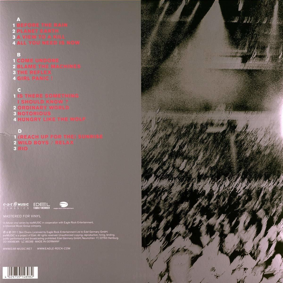 Albumcover mit Titellisten auf weißem Hintergrund.