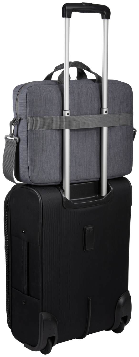 A grey laptop bag on top of a black suitcase. Silver handle bars are visible.
