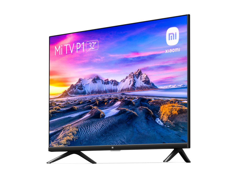 Pantalla Mi TV P1 32", logo Xiaomi. Hermoso paisaje de montañas nevadas al fondo.