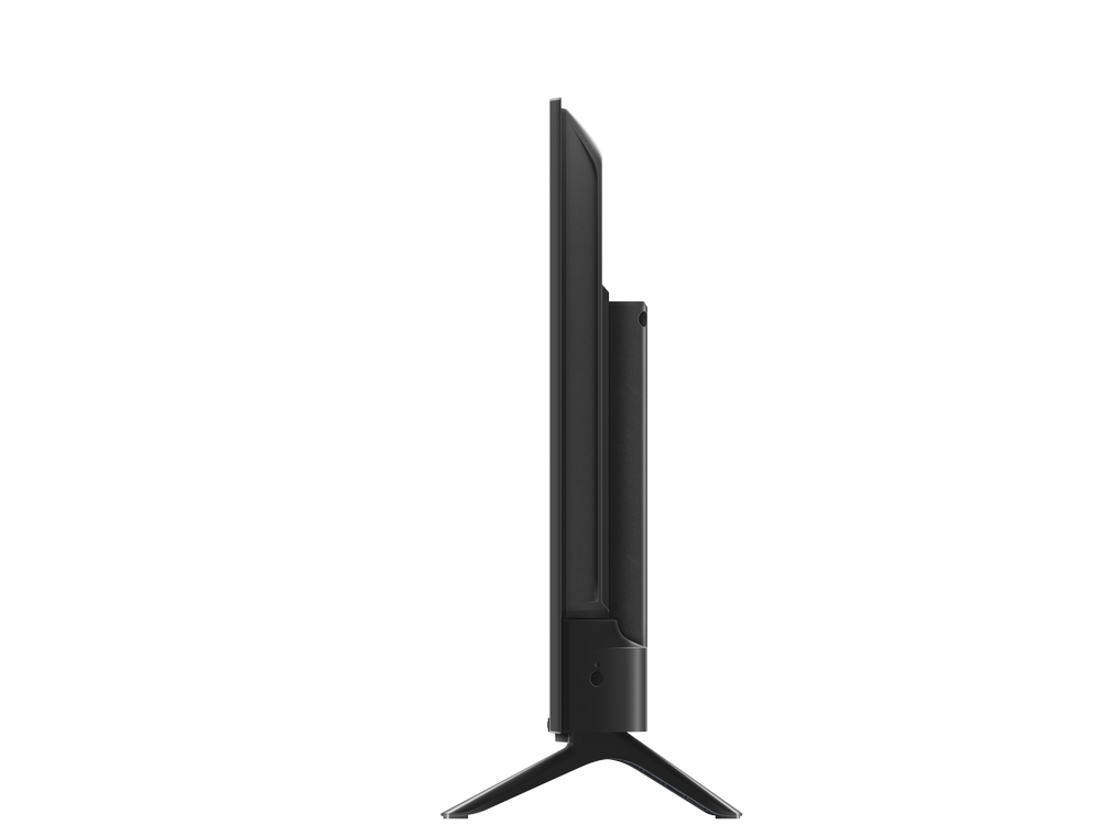 Vista lateral de un televisor negro sobre un soporte. La pantalla mira hacia la izquierda.