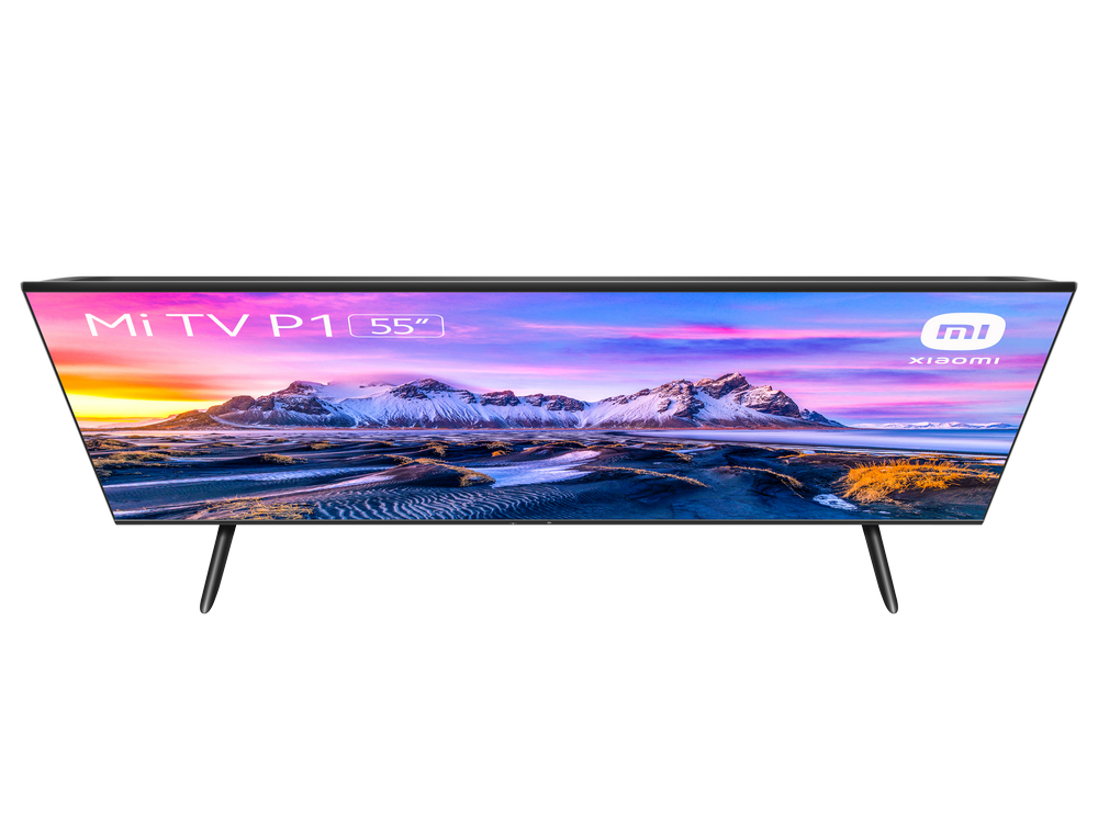 Un televisor Mi TV P1 de 55 pulgadas, mostrando una escena de paisaje con un cielo colorido.