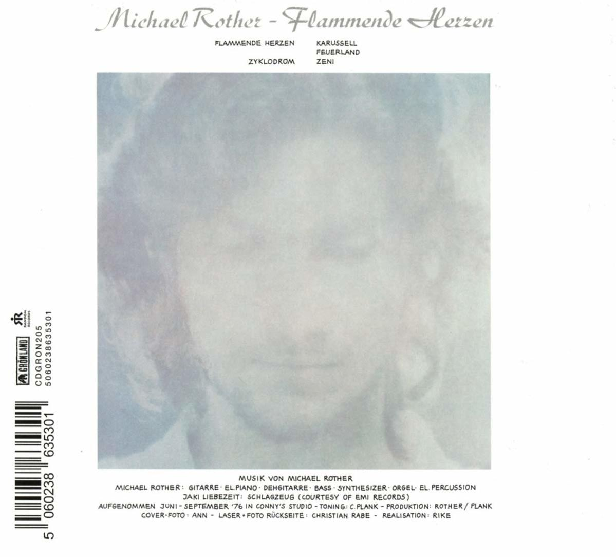 Albumcover mit Text und einem Gesicht.