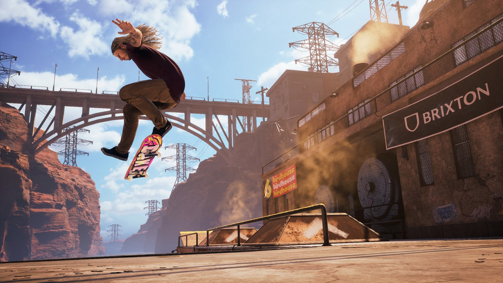 Uno skater a mezz'aria che esegue un trick, con uno skyline sullo sfondo.