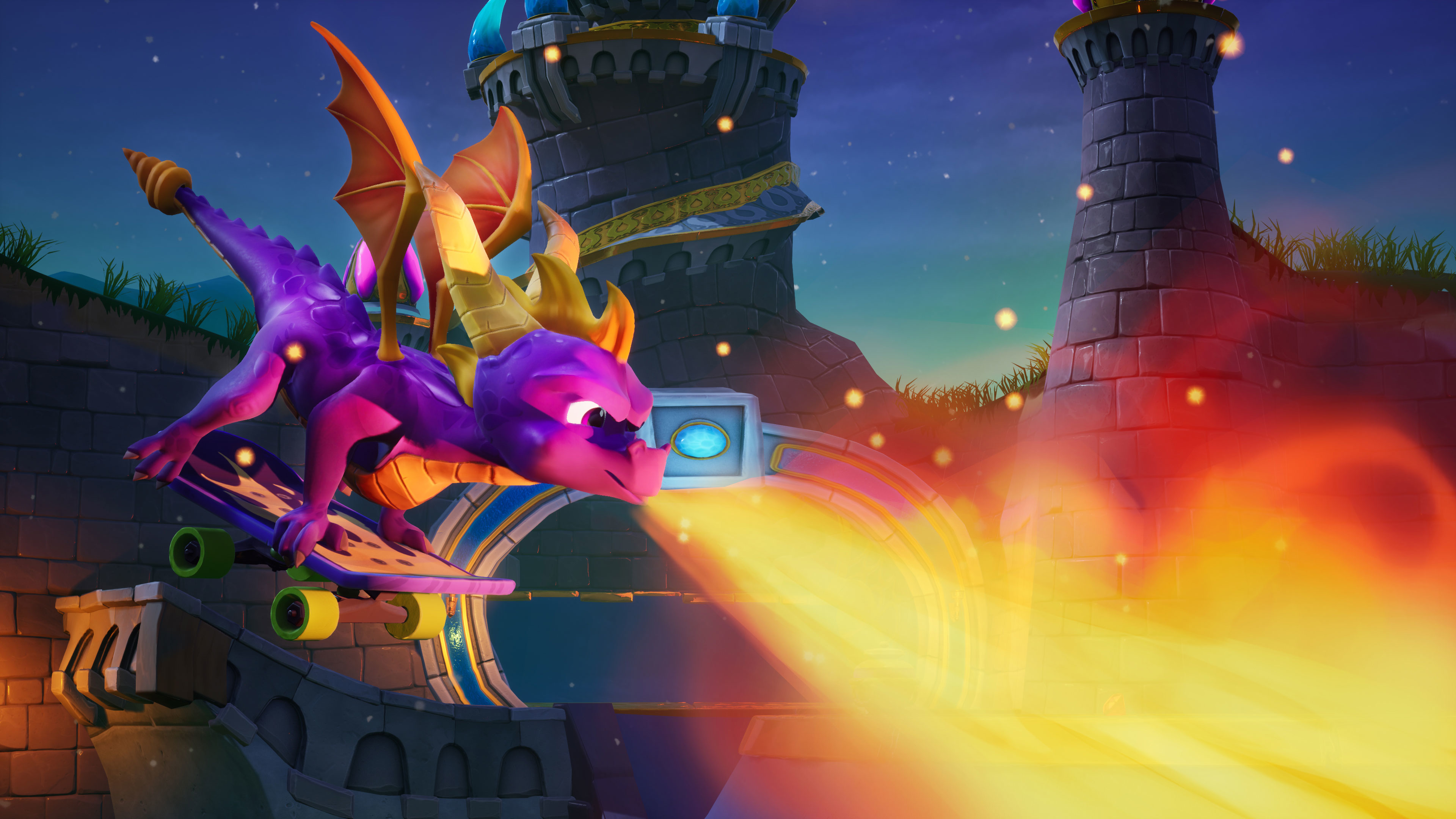 Spyro il drago su uno skateboard, che sputa fuoco. Sfondo castello, cielo blu.