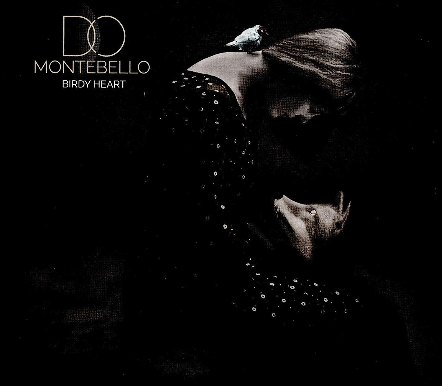 Pochette d'album : Une femme avec un oiseau sur l'épaule, cadre sombre, avec le texte 'Montebello Birdy Heart'.