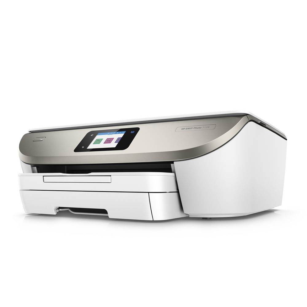 Una impresora HP Envy Photo 7134. Es principalmente blanca y tiene una parte superior plateada con una pantalla.